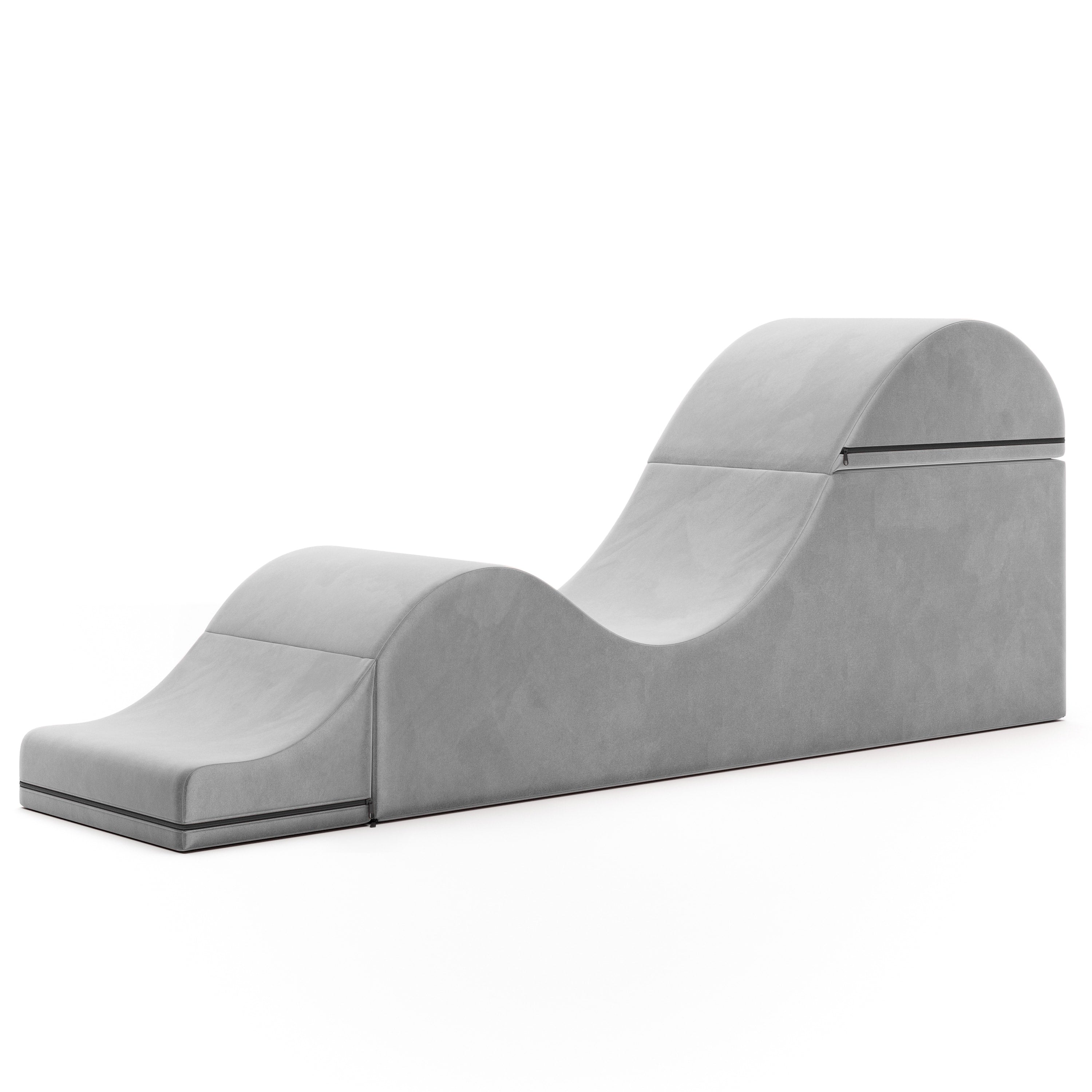 Gray upholstered chaise on a white background