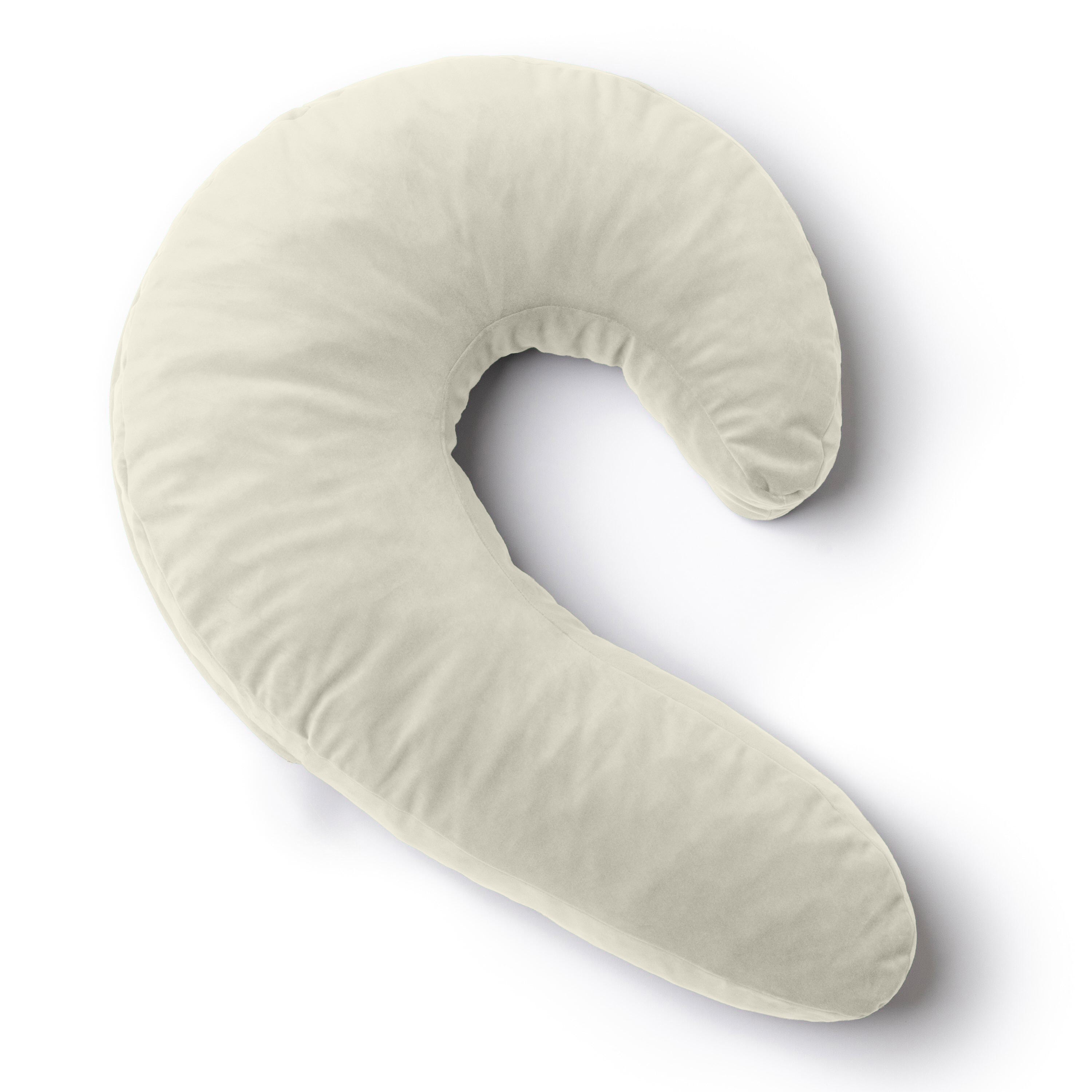 Beige U-shaped pillow on a white background