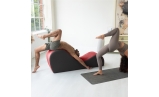 Man and woman doing yoga with Chakra Yoga Chaise